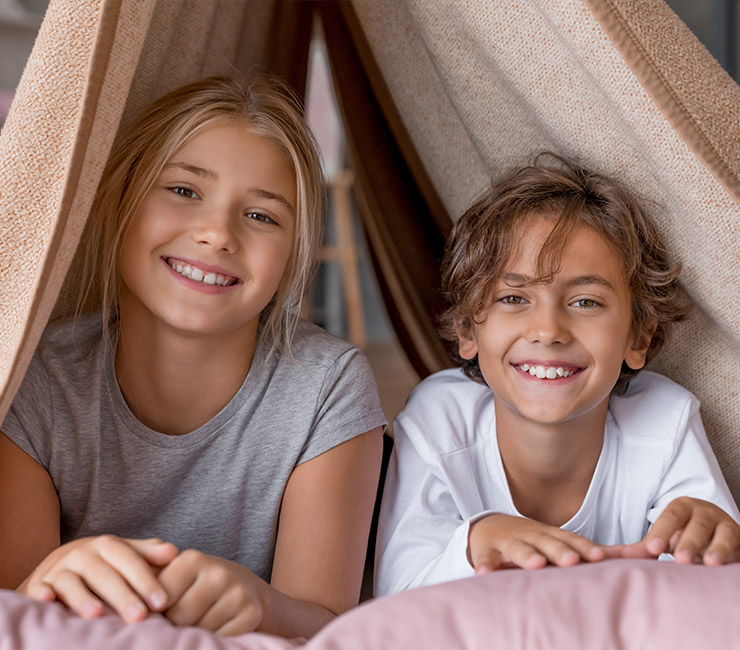 Children hanging out in the slumber tents at The Lodge.